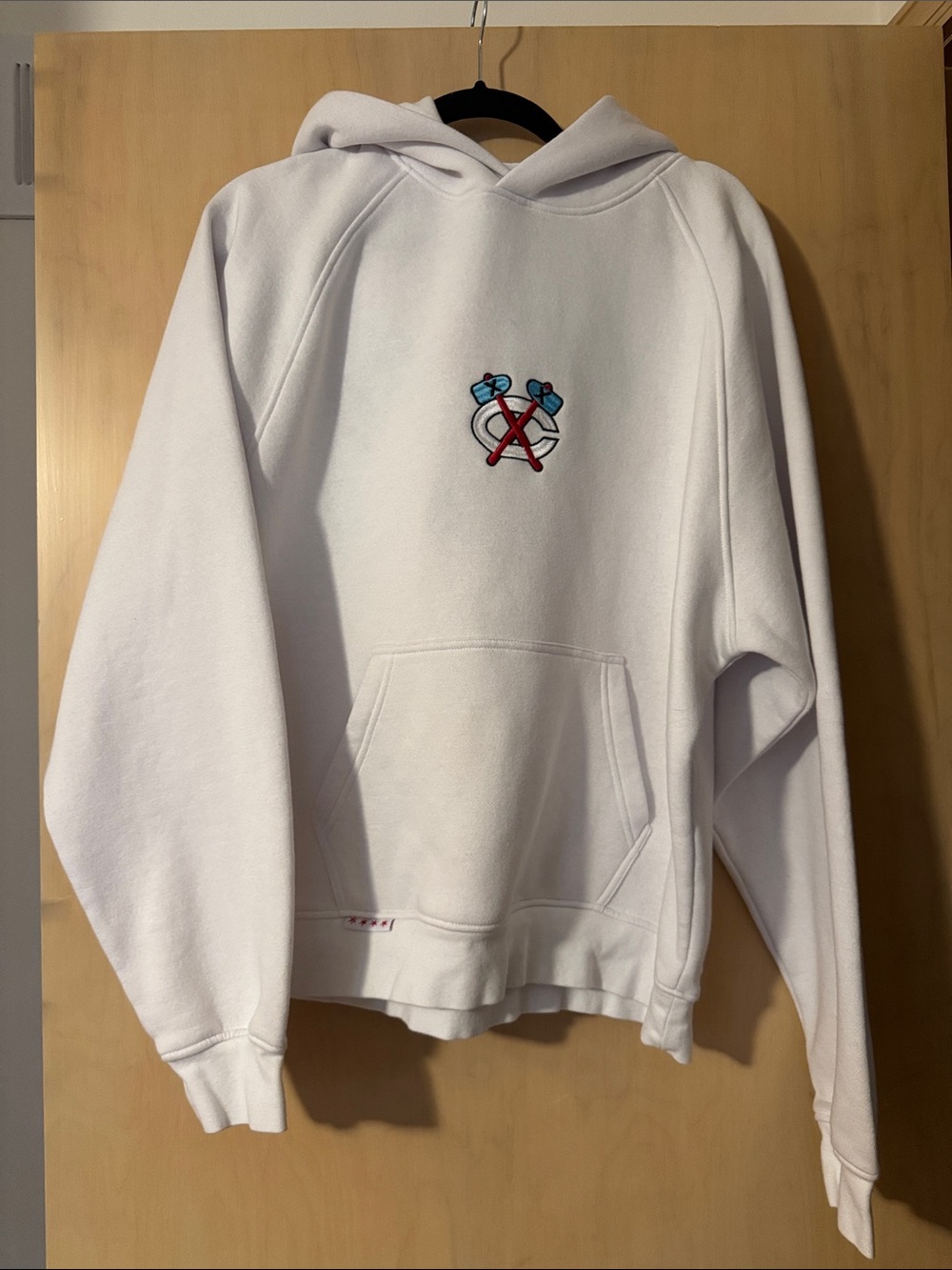 Men's White Crewneck Hoodie with Small Embroidered Crest